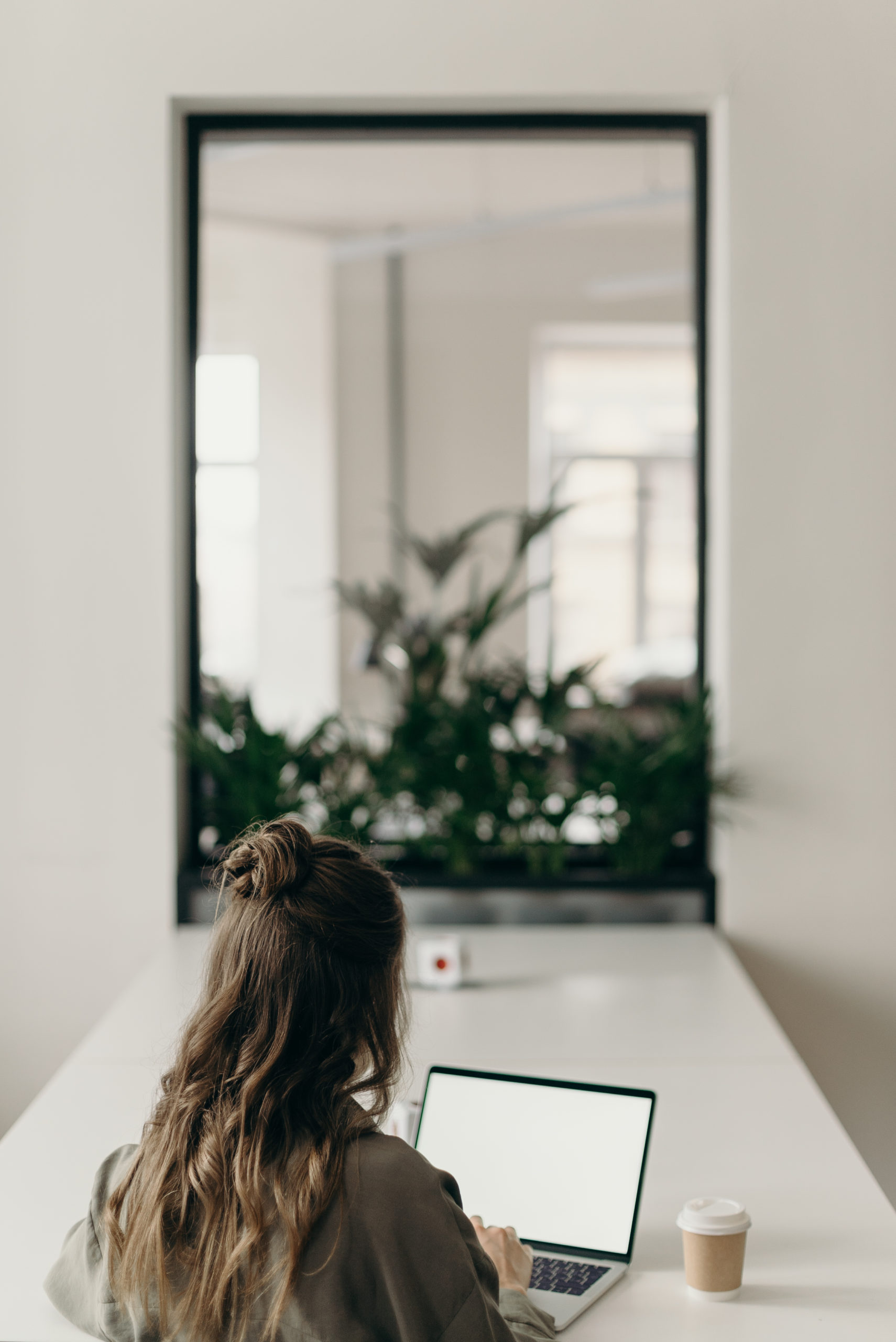 woman-using-laptop-4065624